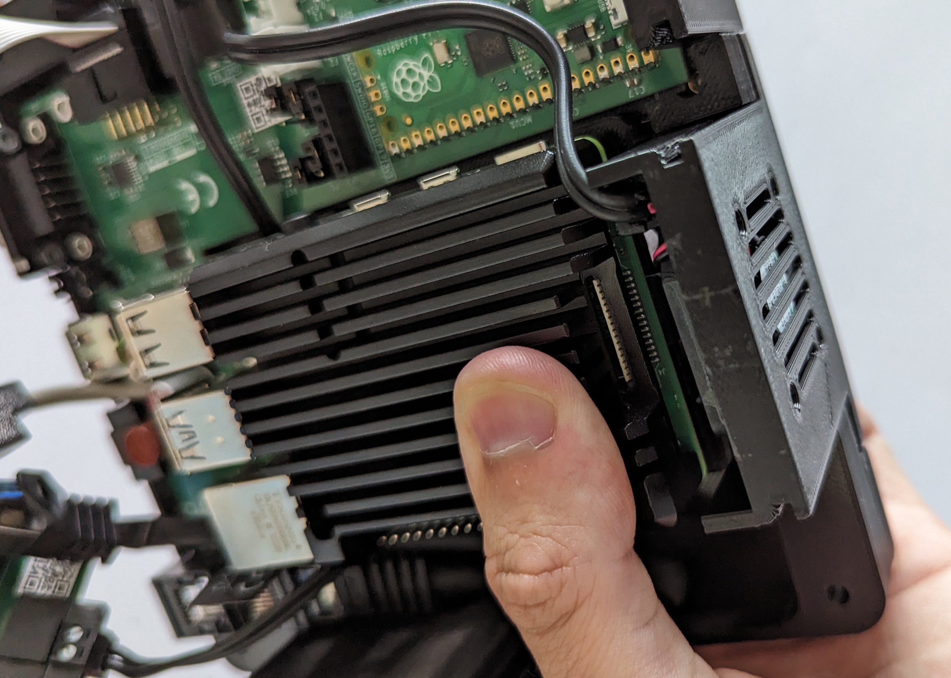 hold_against_enclosure.jpg